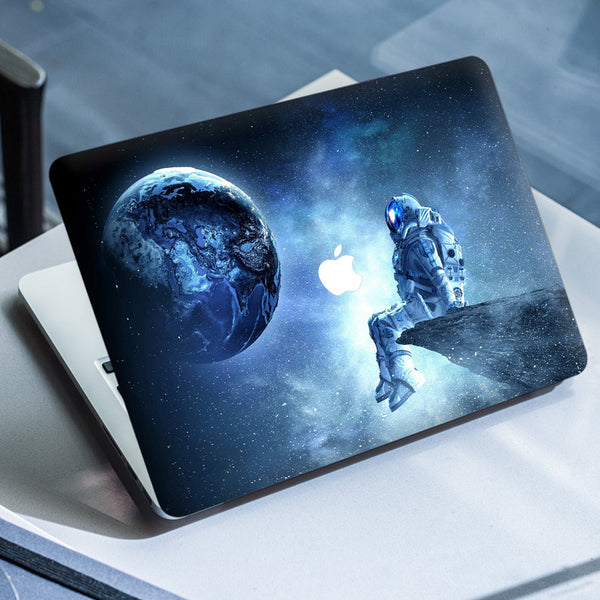 Laptop Skin for Apple MacBook - Astronaut Sits on Stone - SkinsLegend